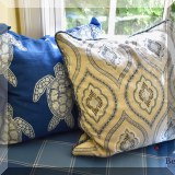 D058. Blue and white down medallion pillow 19” sq. - $24 and down turtle pillow 22” sq. - $34 